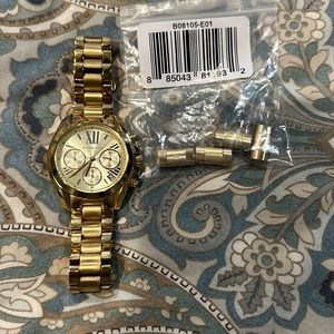 Micheal Kors women’s gold watch